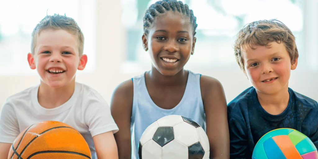 Smilodon Dental + Implants - Kids playing sports