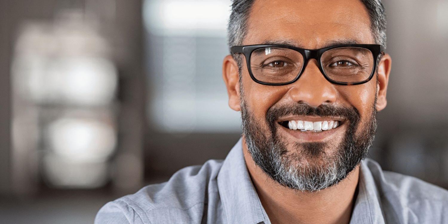 Smilodon Dental + Implants - Happy Adult