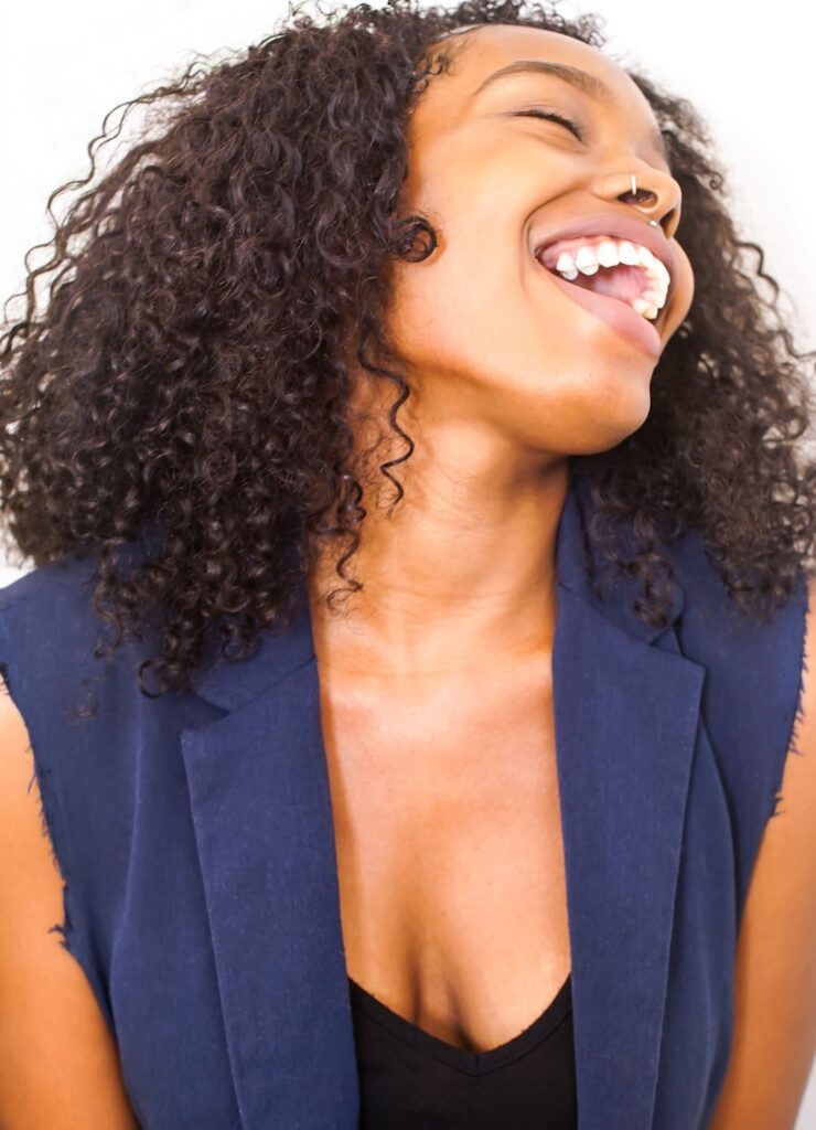 Smilodon Dental + Implants - Happy Adult