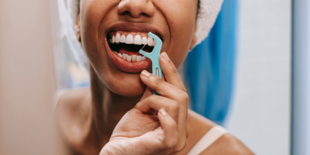 Flossing adult