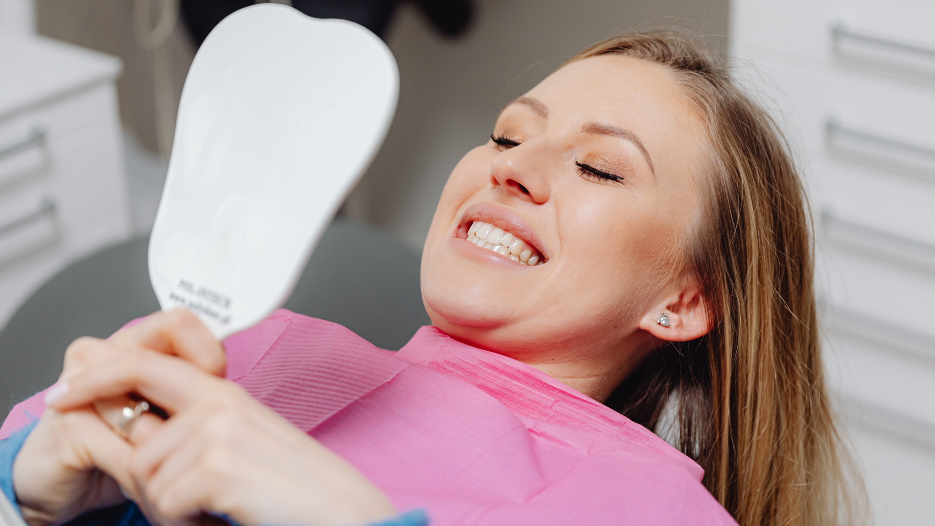 Smiling patient at a dental office